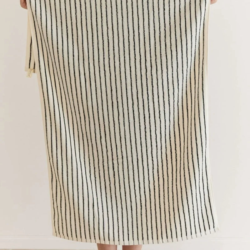 Coastal Aesthetic Room Decor — a striped cotton bath towel held up to show its length and texture. — RoomDen