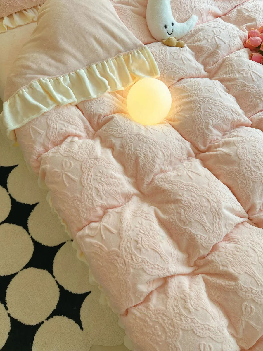Pastel Pink variant of the Ruffled Embossed Fleece Bedding Set, showing the duvet cover's texture with a warm orb light - RoomDen.