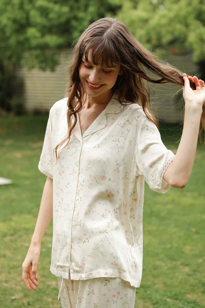 Close Up of Floral Pattern and Pearl Buttons on Pajama Top - RoomDen