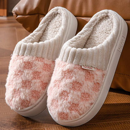 Close up of pink and white fuzzy fleece slippers with knit cuff - RoomDen