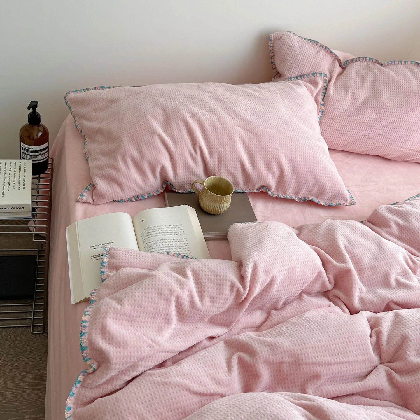 Another view of the Blush Pink Waffle Fleece Bedding Set, highlighting its soft texture and color.