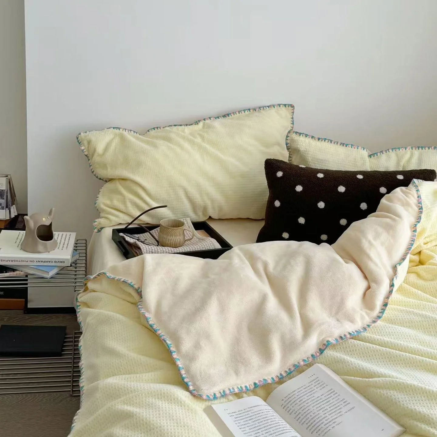 Main image of the Butter Yellow Plush Waffle Fleece Bedding Set variant, styled with a breakfast tray. - RoomDen