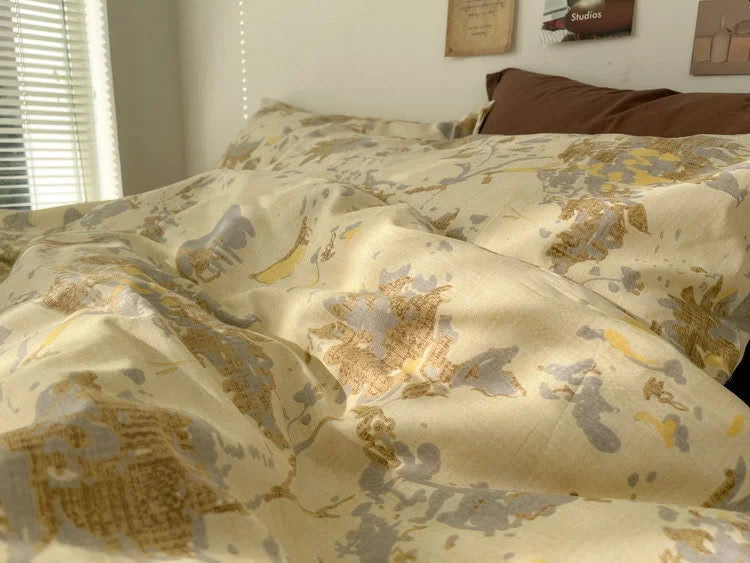 Detailed close-up of the fabric of the vintage floral washed cotton duvet cover, showing the painterly details of the pattern. - RoomDen