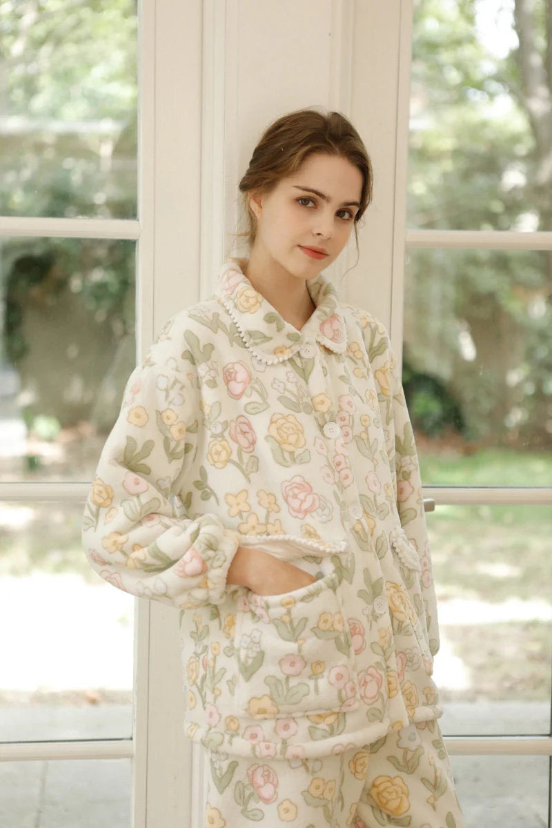 Woman with hands in pockets of plush floral pajama top - RoomDen