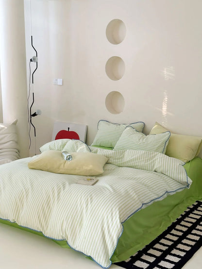 Cozy Sage Green Striped Duvet Cover in Sunlit Room - RoomDen