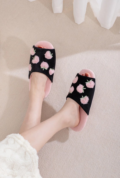 Close Up Detail of 3D Peach Embroidery on Black Plush Slides - RoomDen