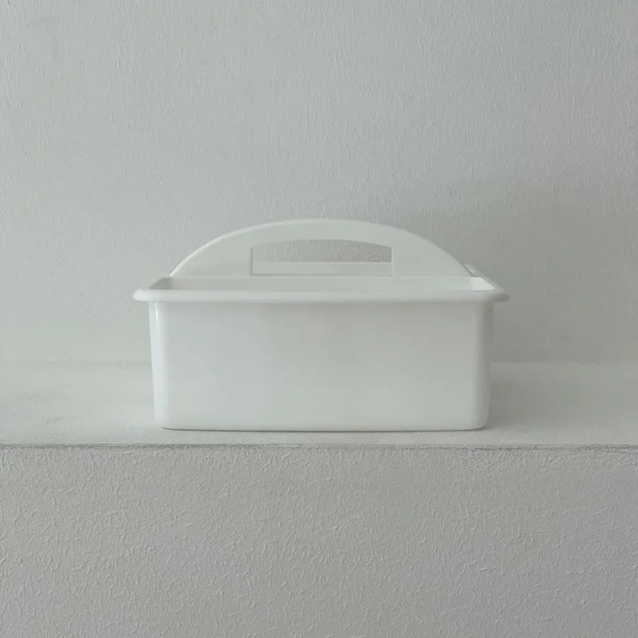 Front view of the white portable organizer caddy against a white textured wall. - RoomDen