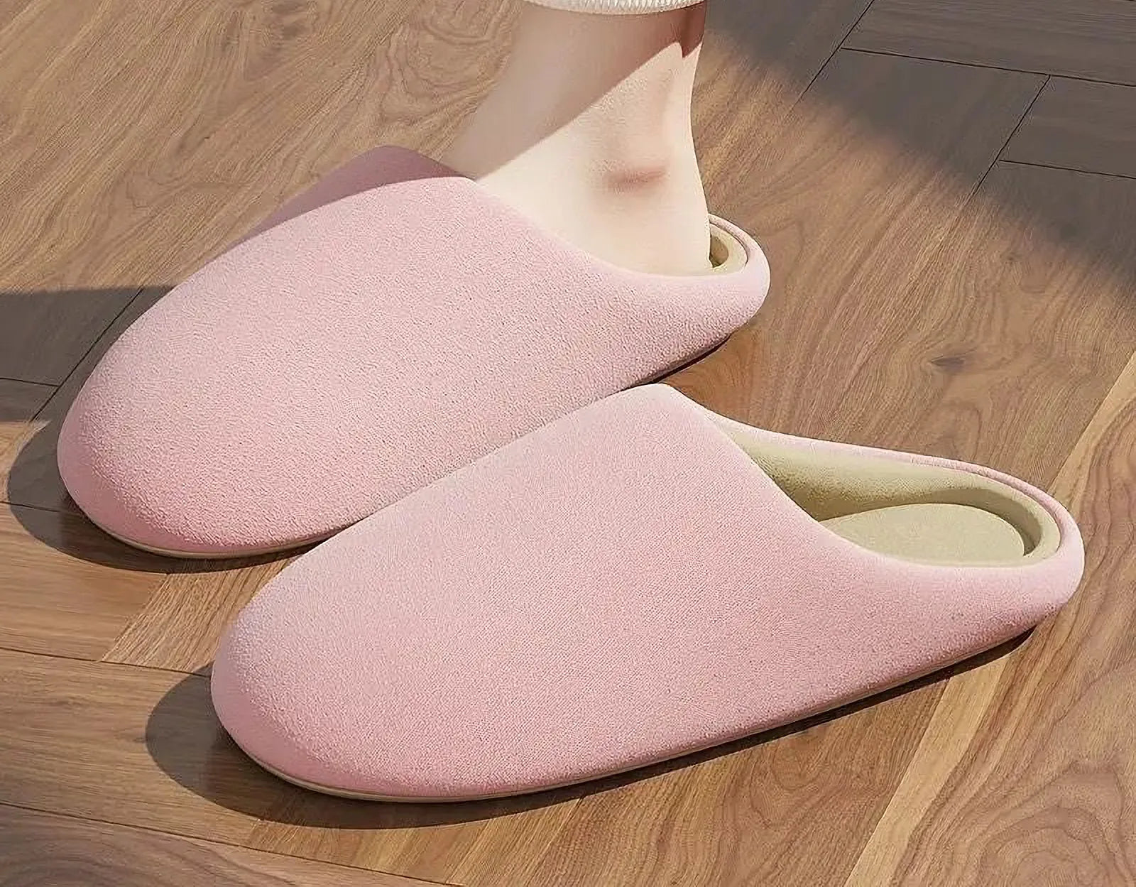 Pink soft cotton house slippers on feet sunlight - RoomDen