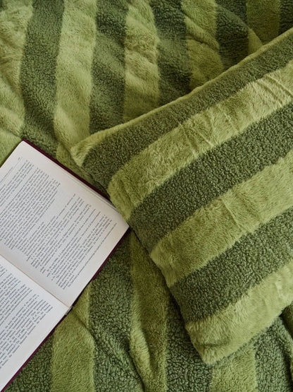 Macro shot of the high-low pile texture on green flannel fabric - RoomDen