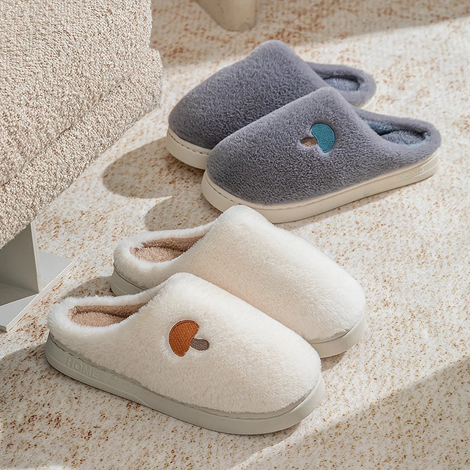 Grey and White Plush Mushroom Embroidered Fleece House Slippers on beige carpet near sofa - RoomDen