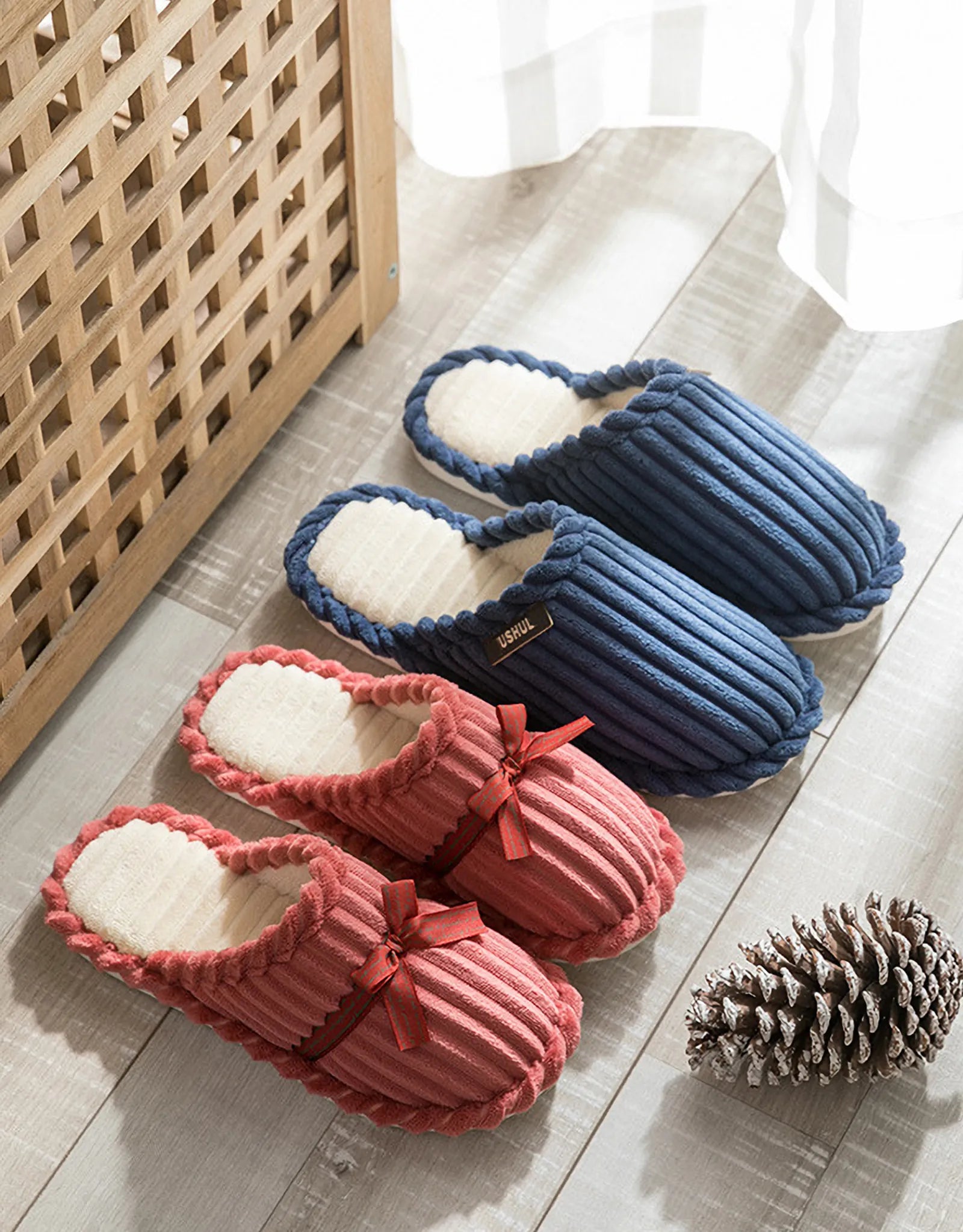 Navy Blue and Dusty Pink Ribbed Slippers on Wooden Floor