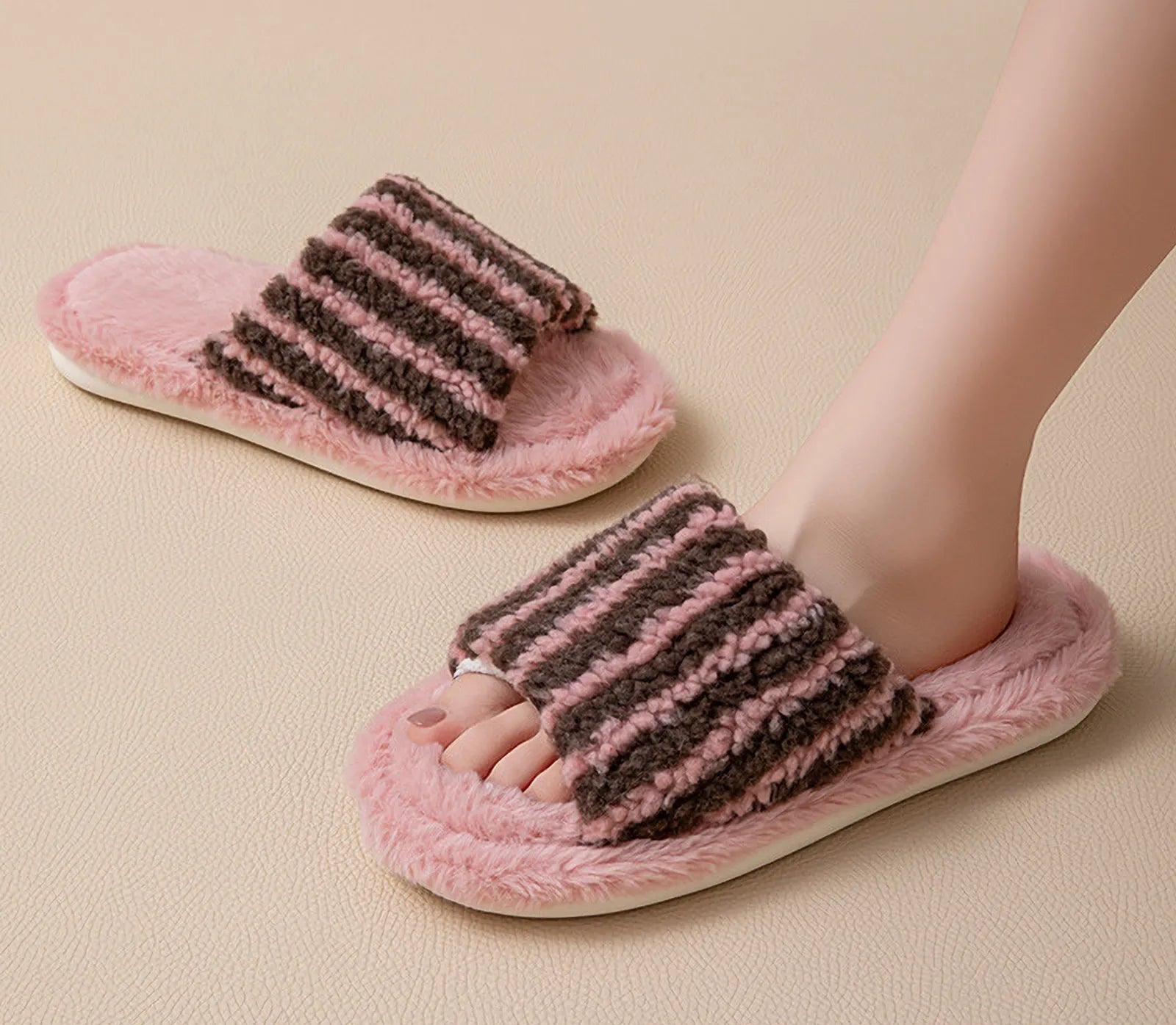 Model wearing mismatched fuzzy slippers showing Pink/Beige and Brown/Blue variants - RoomDen