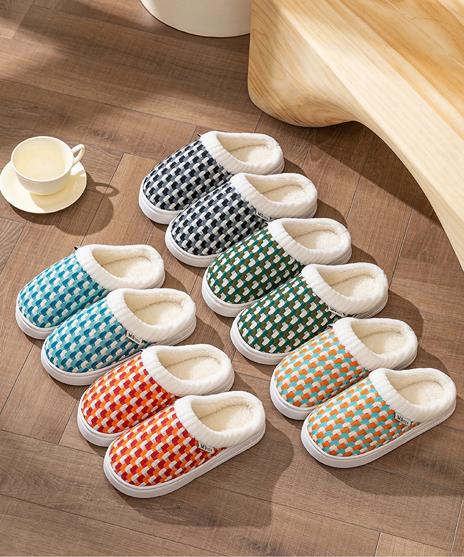 Group shot of fuzzy woven gingham plush house slippers in cyan orange black and green colors - RoomDen