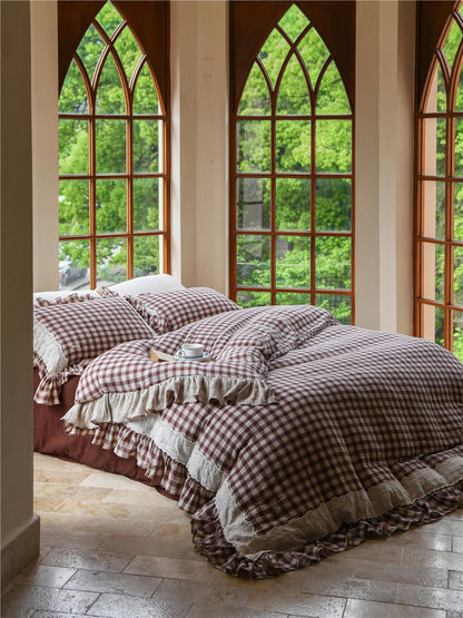 Brown gingham ruffled washed cotton bedding set with lace trim in a bright window room - RoomDen