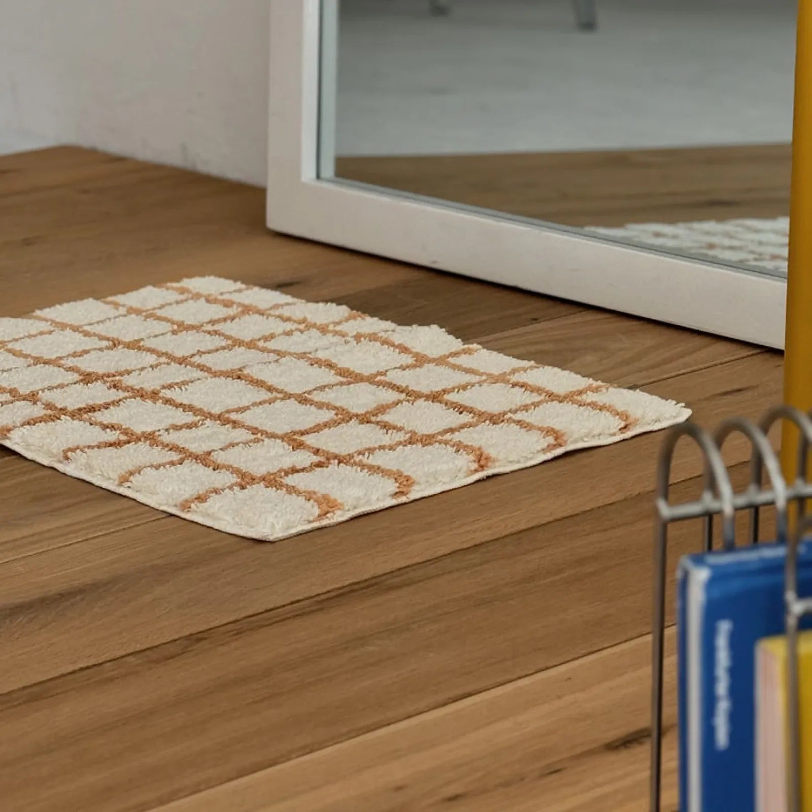 Tufted Shaggy Checkered Plush Accent Rugs - Side Angle on Wooden Floor