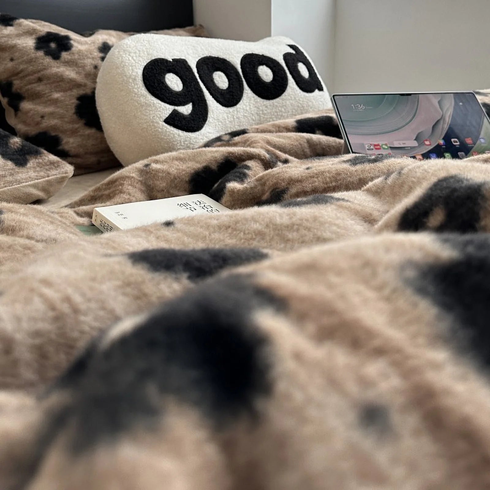 A low-angle, detailed shot focusing on the fuzzy texture of the mocha brown floral flannel fleece duvet cover. - RoomDen