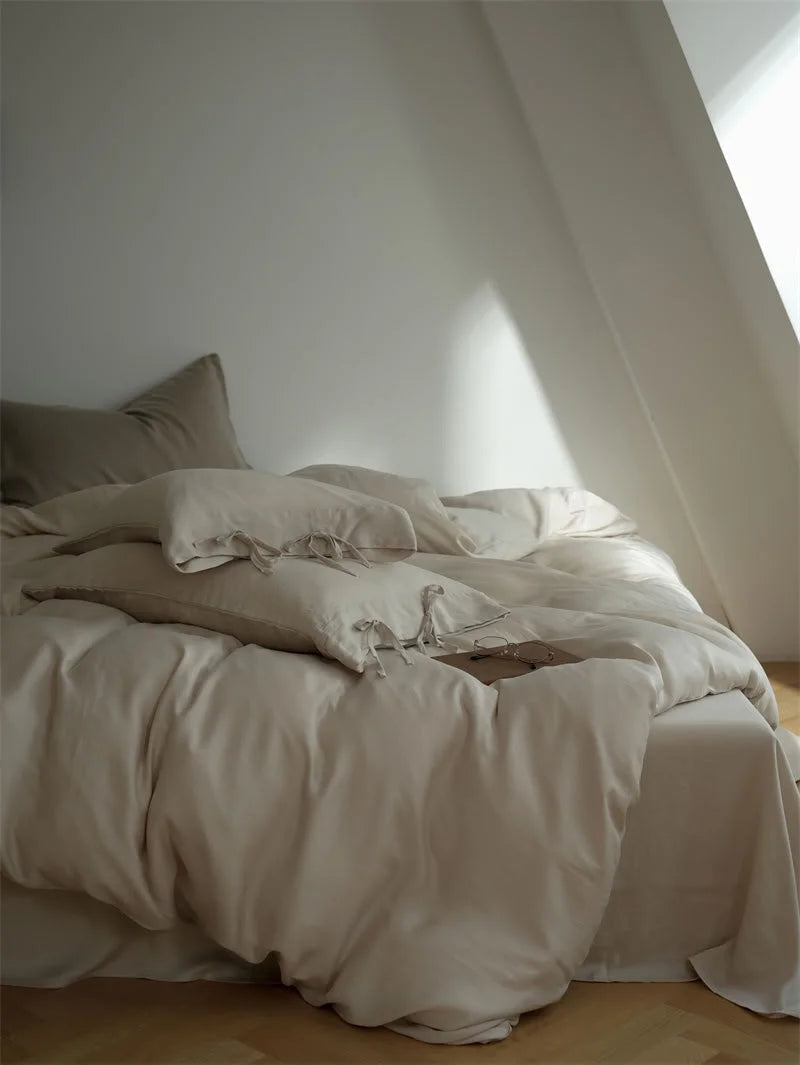 Full view of the Dusty Rose Tencel Bedding Set, creating a serene and warm bedroom atmosphere - RoomDen