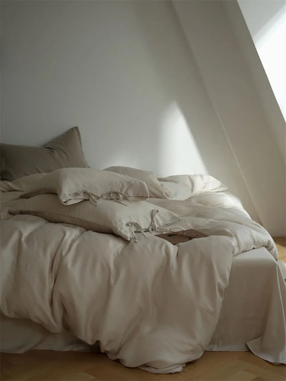 Full view of the Dusty Rose Tencel Bedding Set, creating a serene and warm bedroom atmosphere - RoomDen