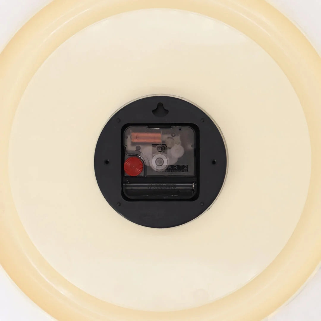Back view of the wall clock showing the battery-operated silent movement mechanism - RoomDen