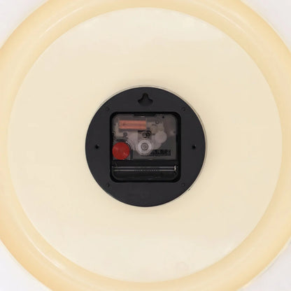 Back view of the wall clock showing the battery-operated silent movement mechanism - RoomDen