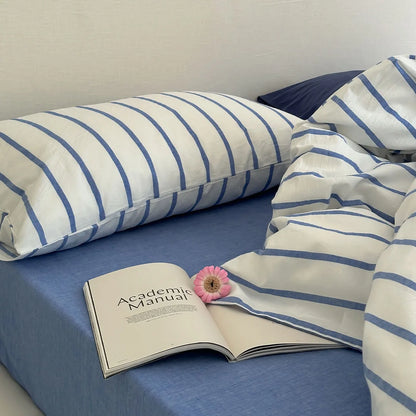 Open Book on Blue Striped Bedding Light Academia Aesthetic - RoomDen