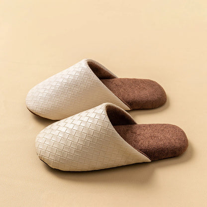 Side profile of beige woven plush slippers on a beige background - RoomDen