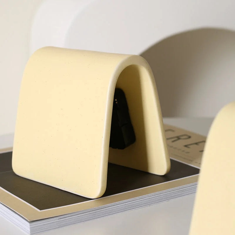 Back view of the Butter Yellow Matte Arch Ceramic Table Clock showing its curved design - RoomDen