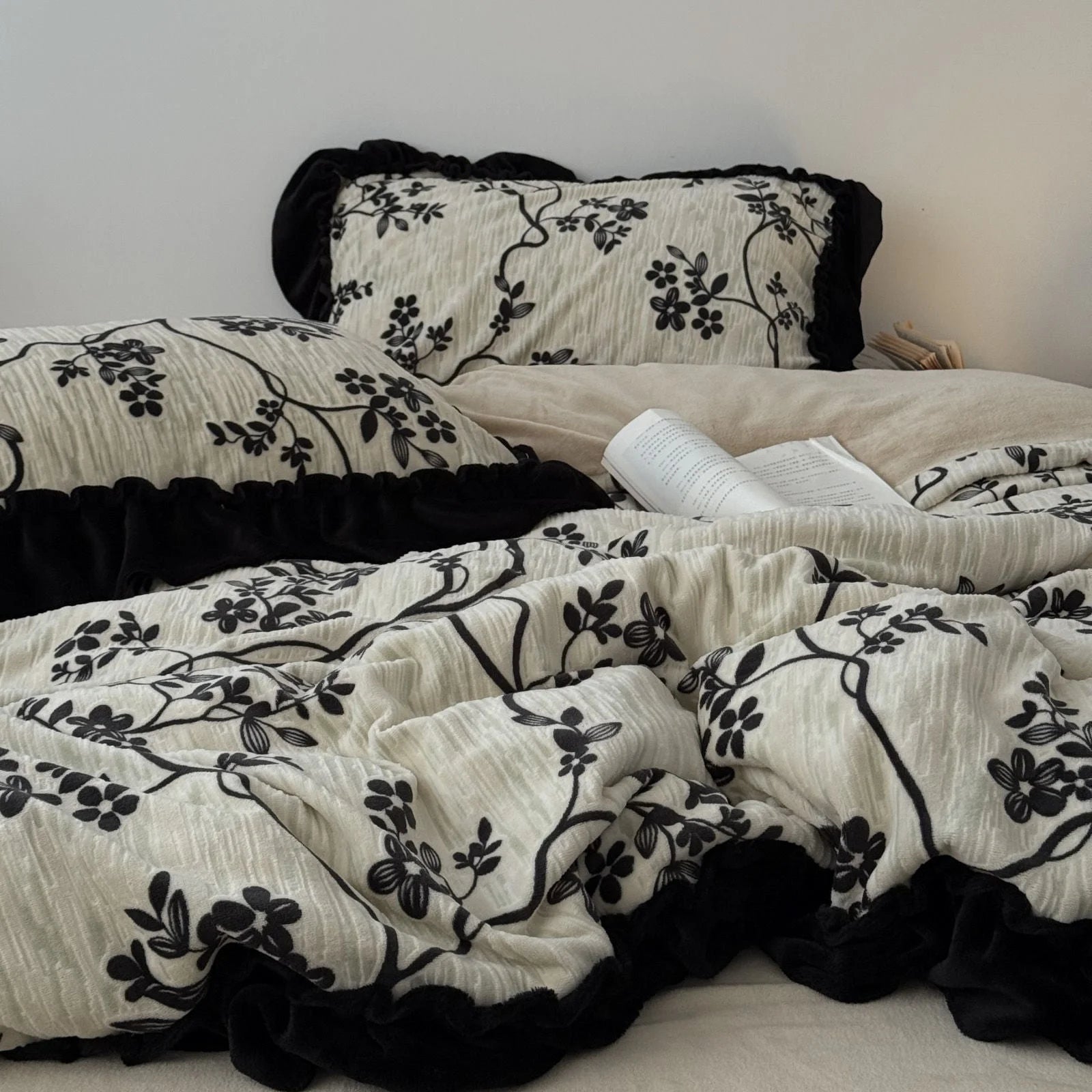 Another perspective of the full bedding set, emphasizing the cozy and rumpled texture of the duvet cover and pillows - RoomDen.
