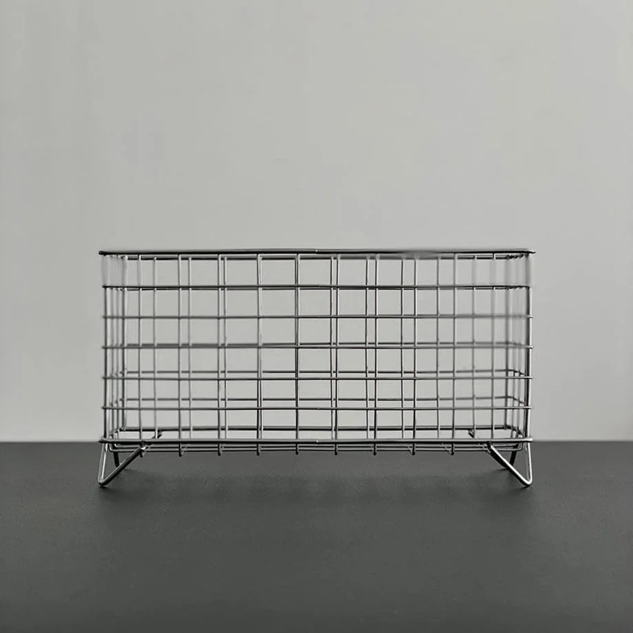 Front view of the empty Wireframe Grid Metal Desktop Organizer on a black surface. - RoomDen