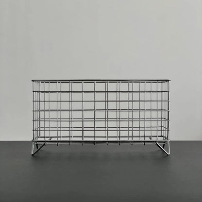 Front view of the empty Wireframe Grid Metal Desktop Organizer on a black surface. - RoomDen