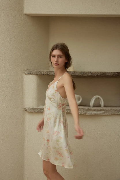 RoomDen Silky Vintage Floral Cotton Sateen Slip Dress - Spinning movement showcasing hem