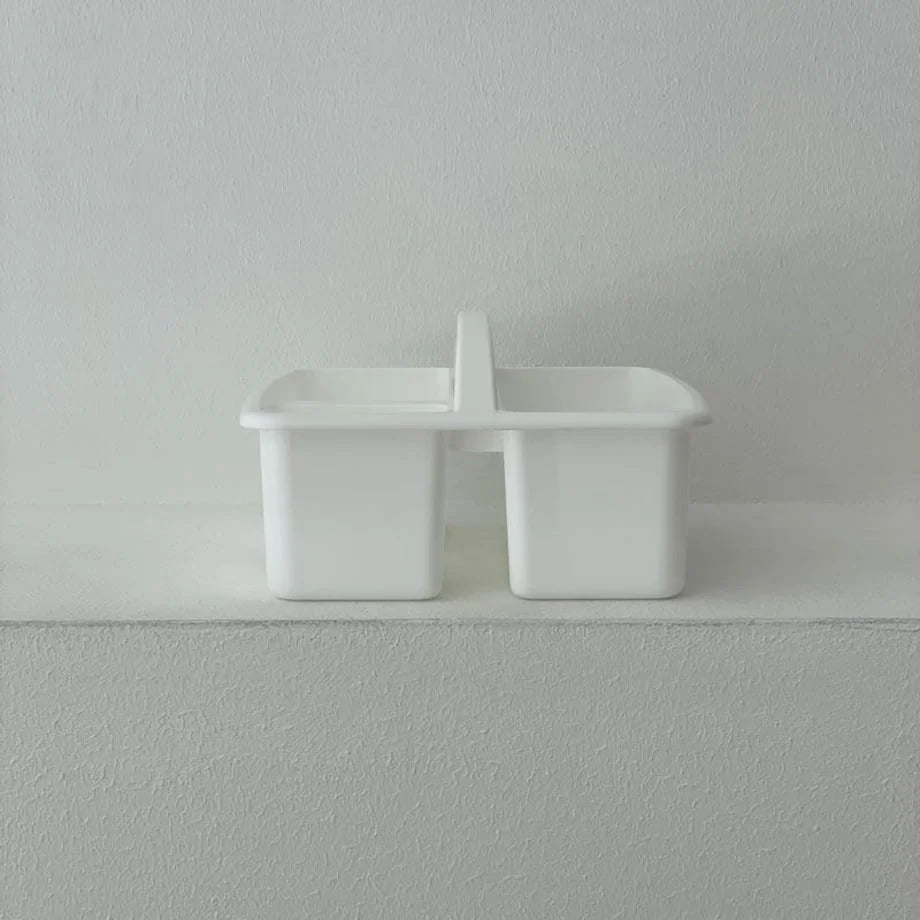 Side view showing the two compartments of the white organizer caddy. - RoomDen