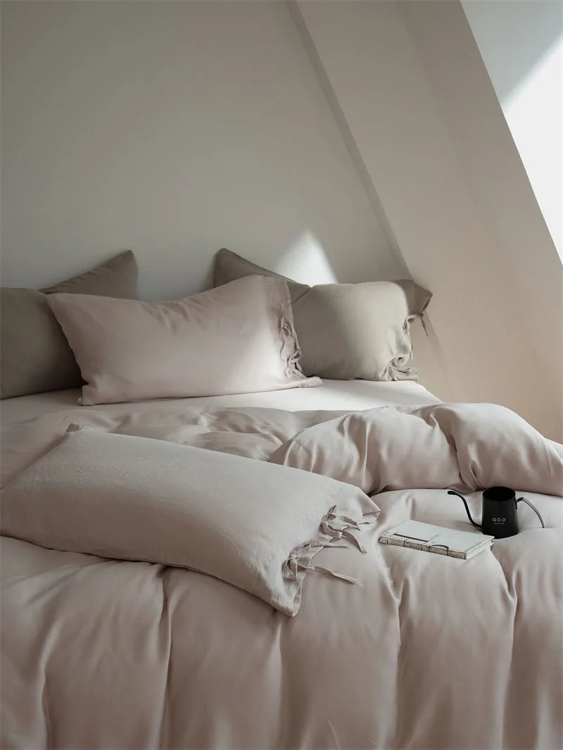 Another view of the Dusty Rose Tencel Bedding Set, highlighting the tie-closure pillowcases - RoomDen