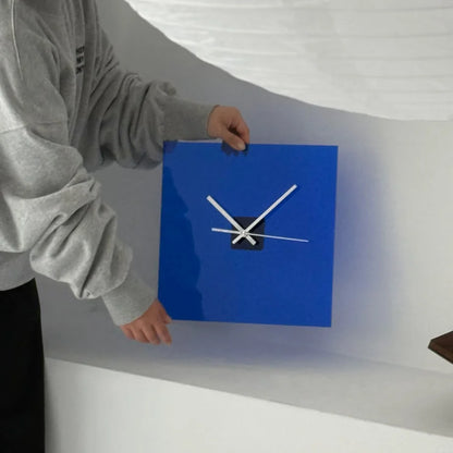 Placing the Cobalt Blue square acrylic clock against a white wall. - RoomDen