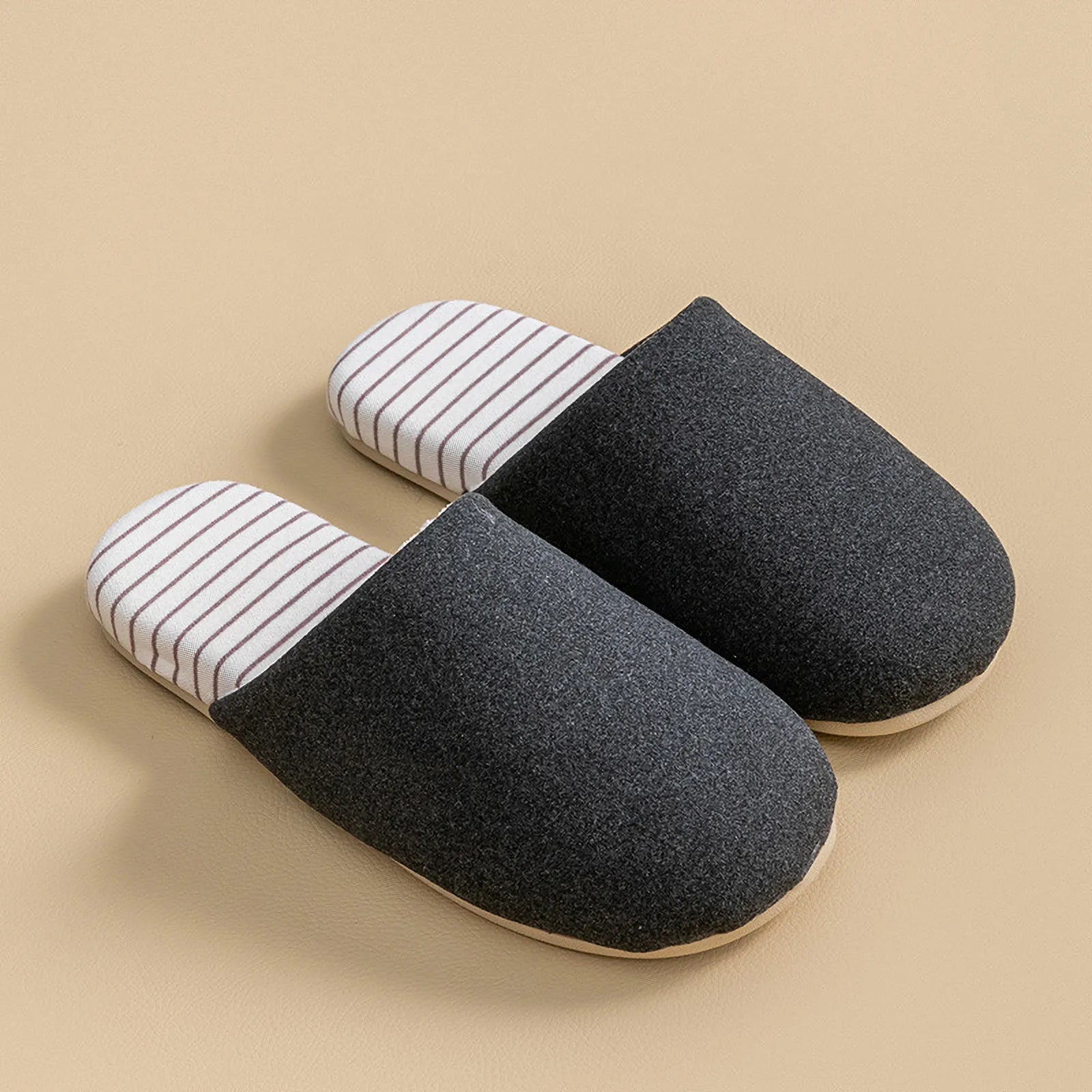 Side view of black cotton house slipper with plush lining and striped footbed - RoomDen