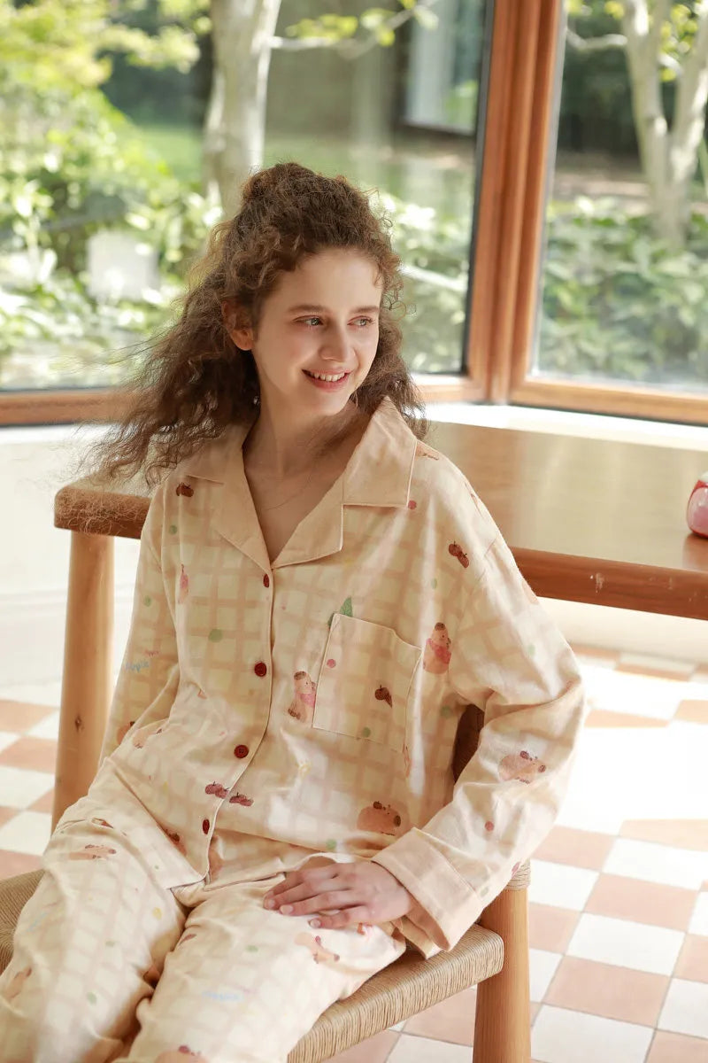 Model Wearing Beige Plaid Pajama Set Sitting in Sunlit Room - Kawaii Style