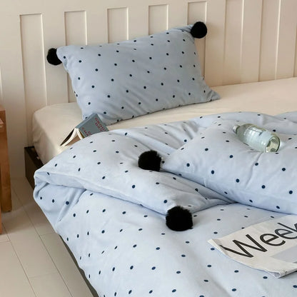 Angled shot of the Baby Blue Polka Dot Velvet Bedding Set, highlighting the duvet cover and matching pillow sham. - RoomDen