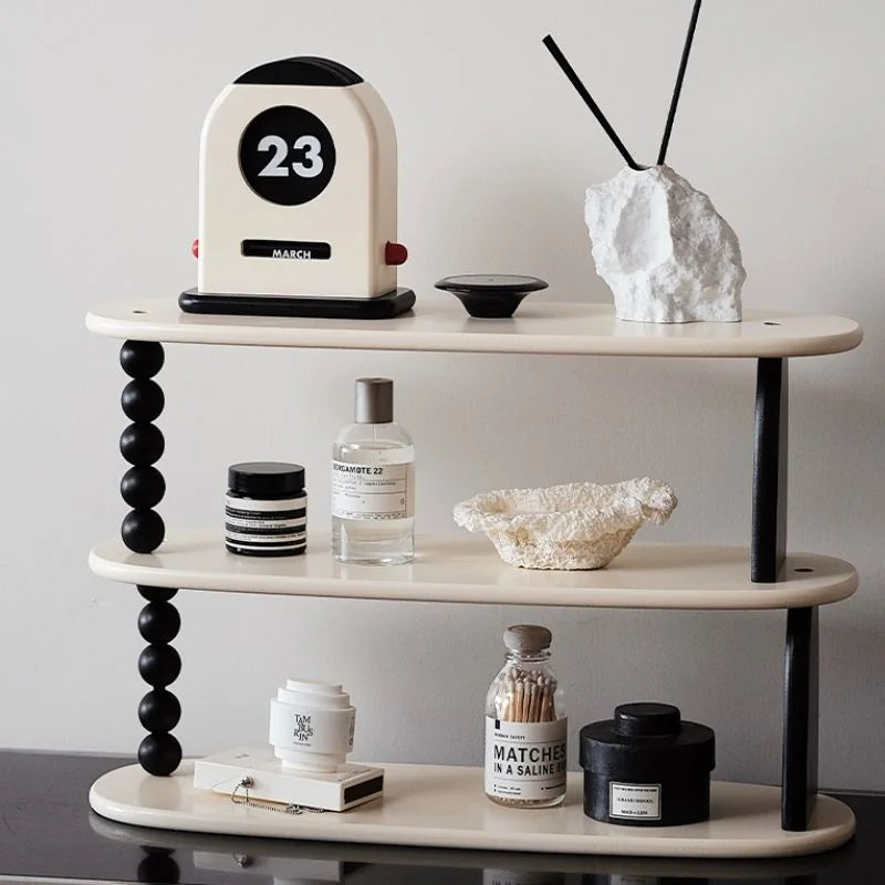 Lifestyle scene showing the perpetual calendar on a three-tiered shelf with other decorative objects - RoomDen
