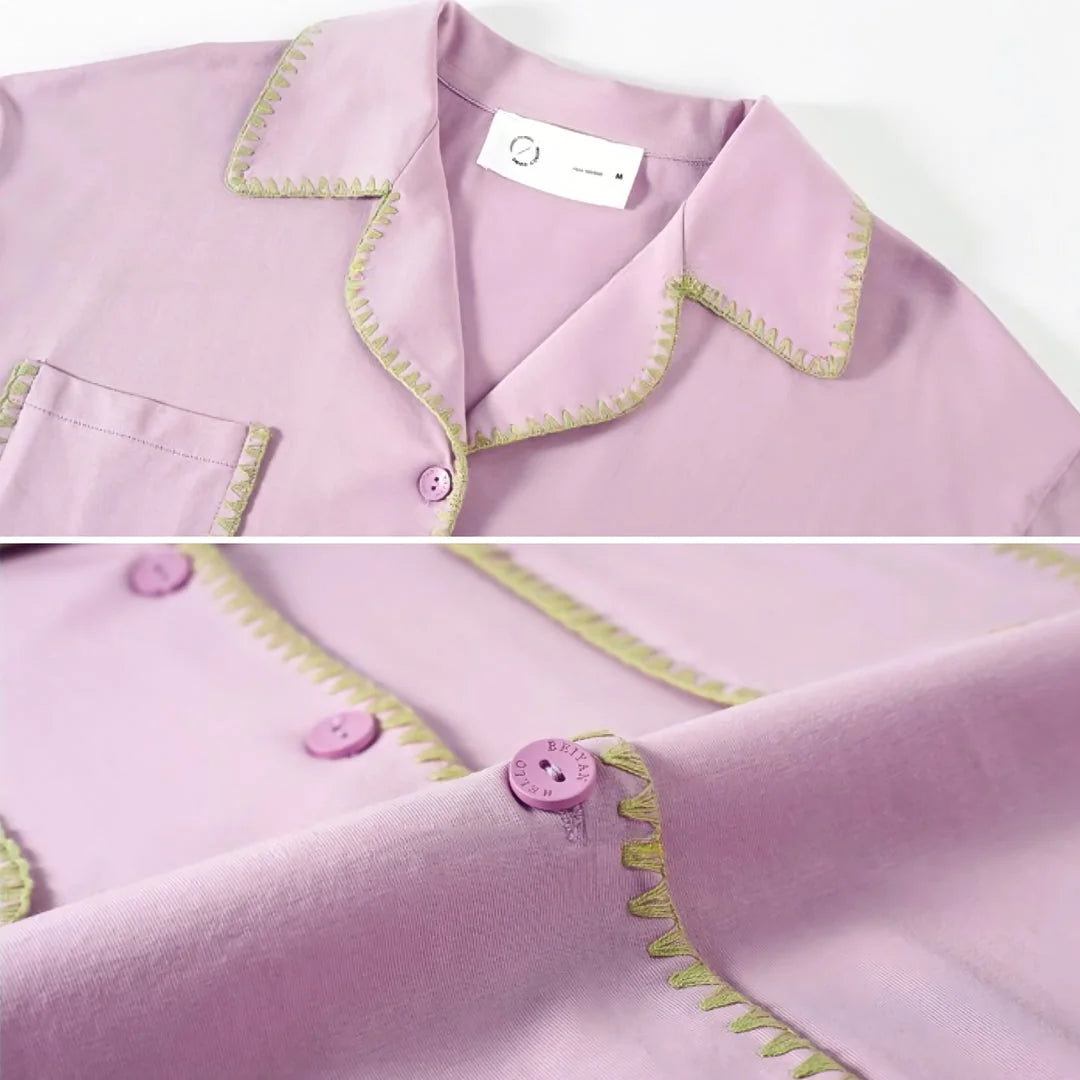 Detailed close-up shots of the lavender pajama top's collar, embroidered trim, and button. - RoomDen