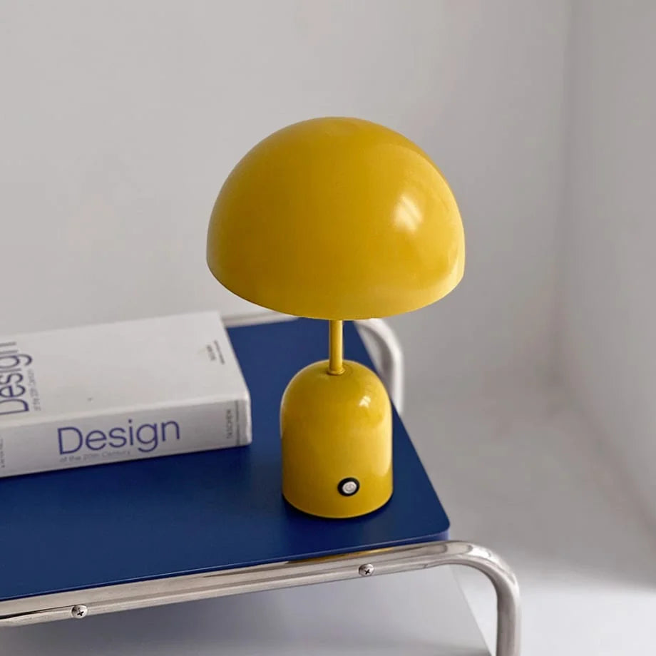 Close-up view of the Canary Yellow metal mushroom lamp, showing its smooth finish - RoomDen