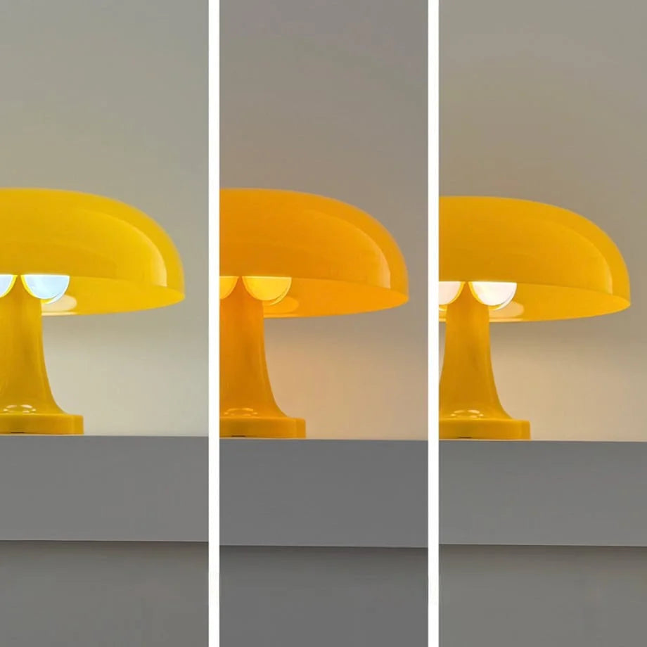 The marigold yellow mushroom lamp demonstrating its three adjustable light temperatures - RoomDen.