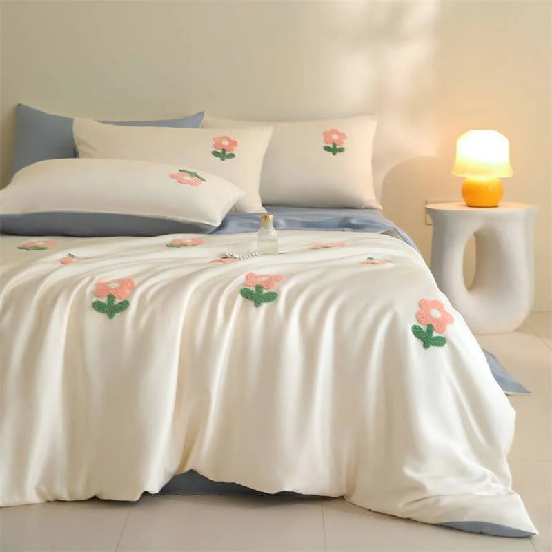 Side profile of the bed dressed in the White & Sky Blue Tufted Doodle Flower Tencel Bedding Set. - RoomDen