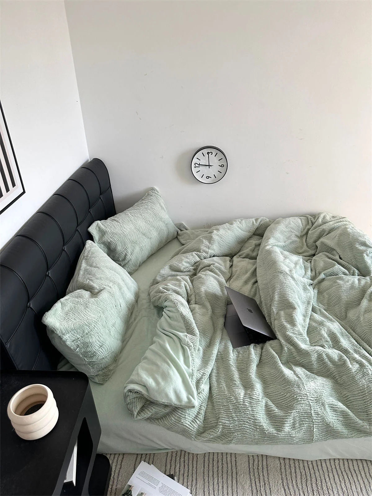 Top-down view of the cozy Sage Green bedding in a corner, showing its soft and inviting appearance. - RoomDen