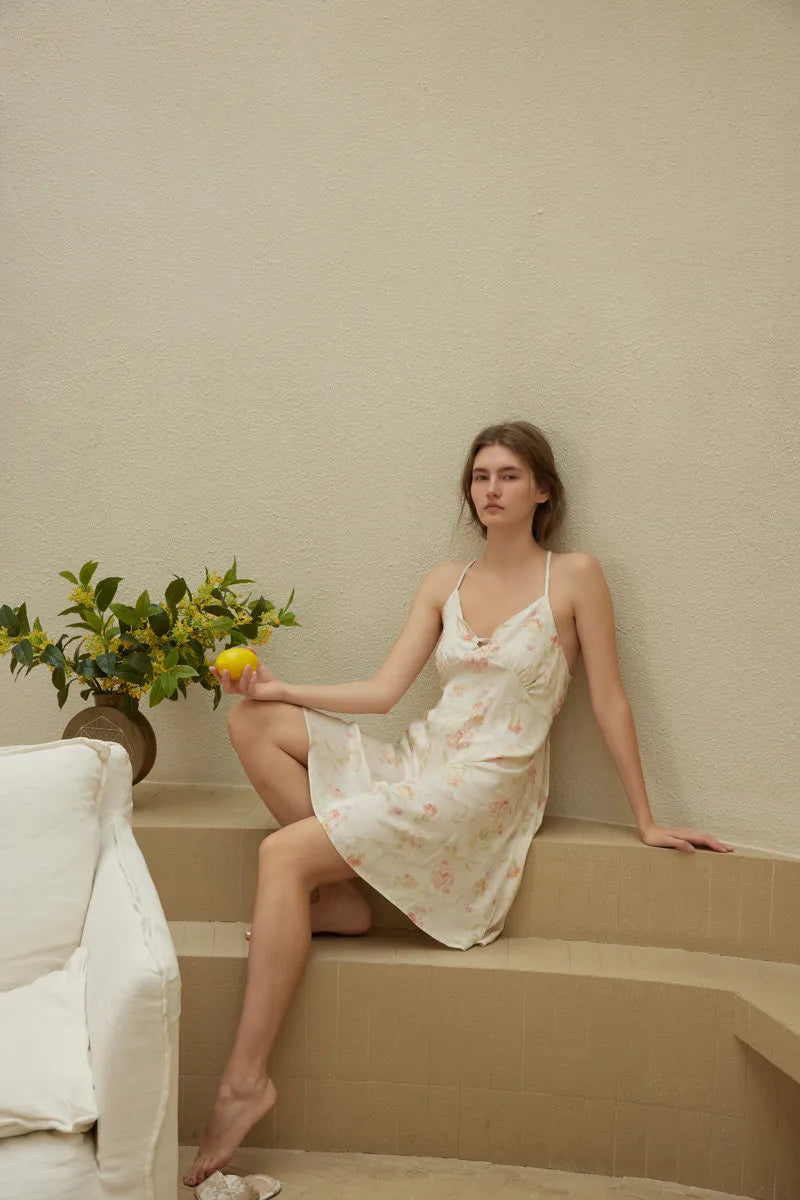 RoomDen Silky Vintage Floral Cotton Sateen Slip Dress - Lifestyle sitting with lemon