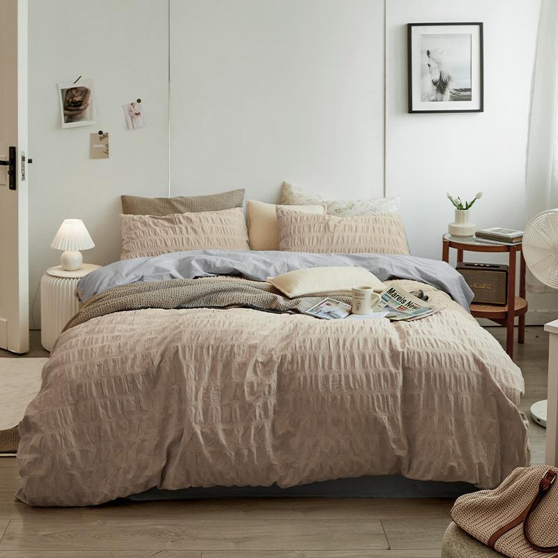 Marlon Seersucker Cotton Bedding Set – full khaki bed with textured bedding beneath framed artwork - Roomden