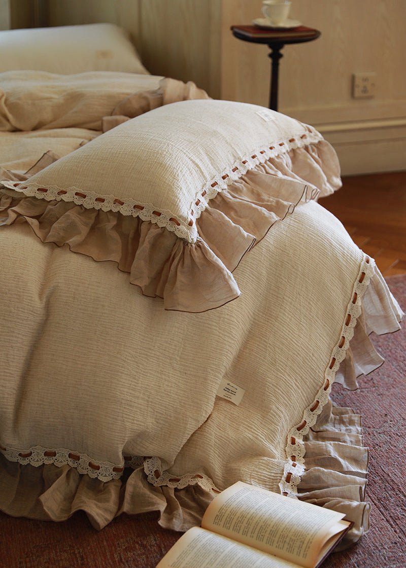 Elderfield Ruffle Lace Cotton-Linen Bedding Set – near view of the cream duvet and ruffled pillow edge - Roomden