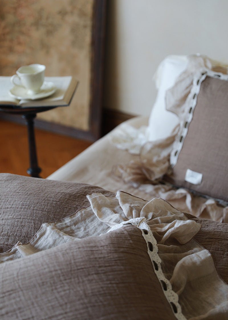 Elderfield Ruffle Lace Cotton-Linen Bedding Set – near view of the cocoa pillow and light decorative edging - Roomden