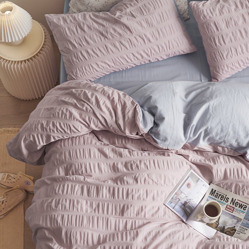 Marlon Seersucker Cotton Bedding Set – overhead view of lilac-pink seersucker bedding - Roomden