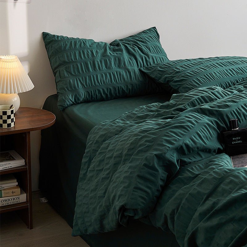 Marlon Seersucker Cotton Bedding Set – close view of forest-green seersucker fabric and pillows - Roomden