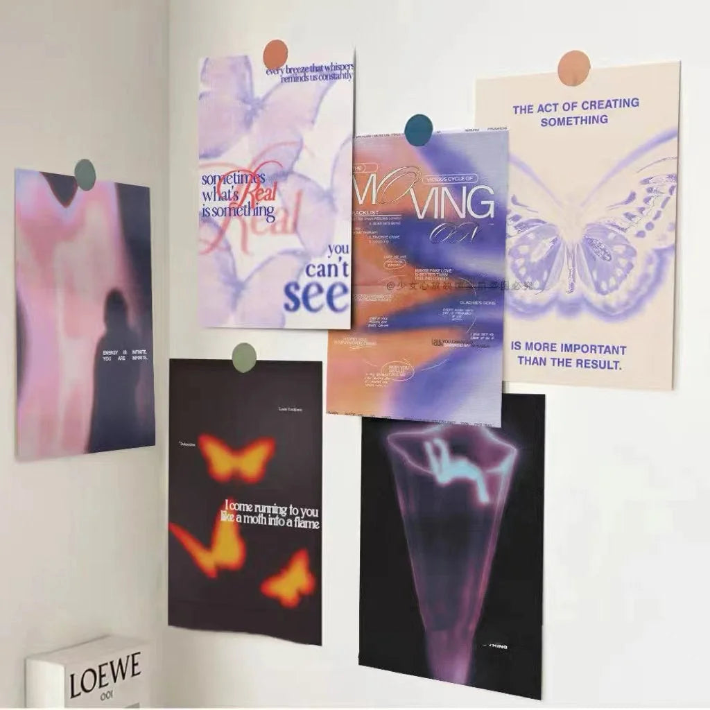 Angled view of the Aura Gradient wall collage kit posters displayed on a corner wall. - RoomDen